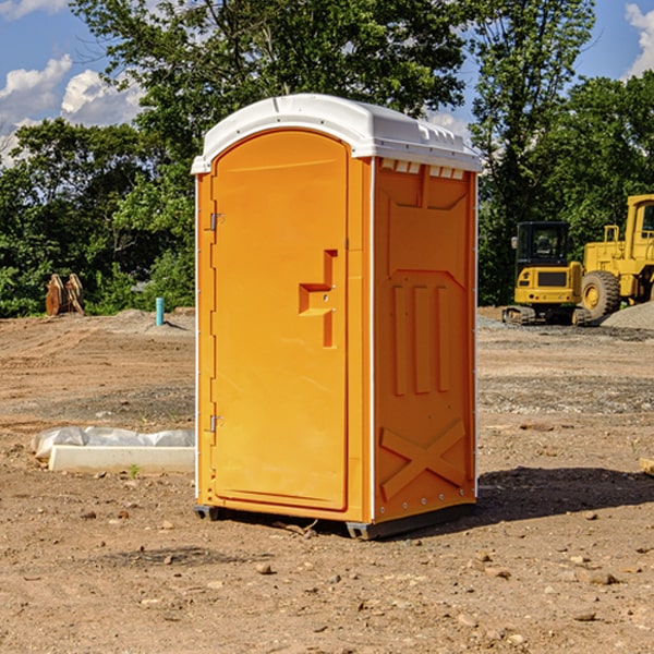 how often are the portable restrooms cleaned and serviced during a rental period in West Scio